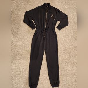 Young Fabulous & Broke black jogger jumpsuit with zipper front and tie waist